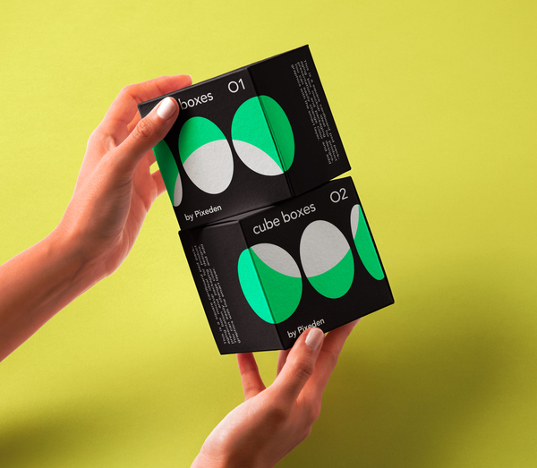 Hands Holding Branding Cube Boxes Mockup