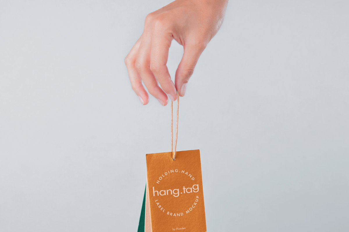 Download Hand Holding Psd Tag Label Mockup | Psd Mock Up Templates | Pixeden