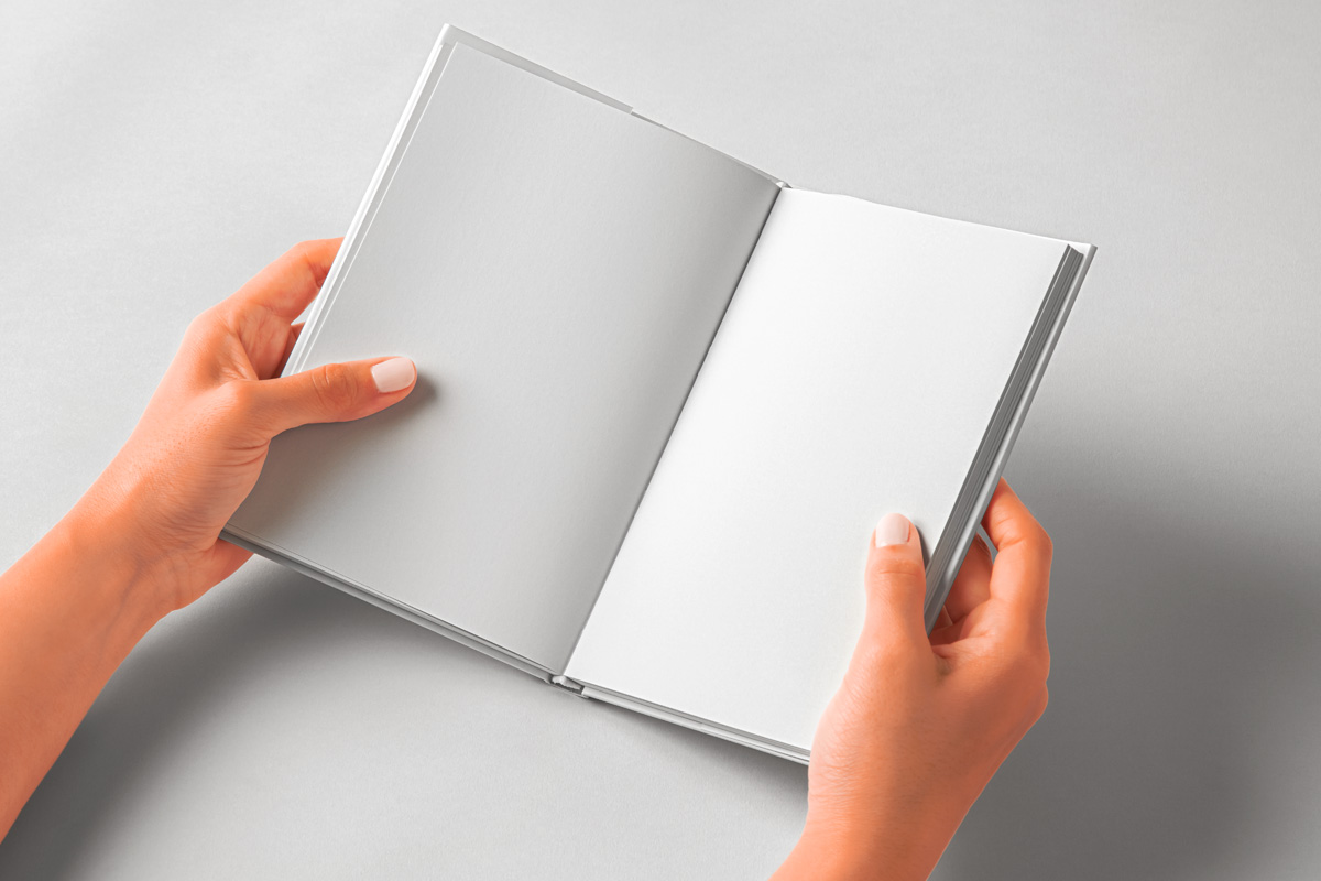 Hands Holding Open Psd Book Mockup Psd Mock Up Templates Pixeden