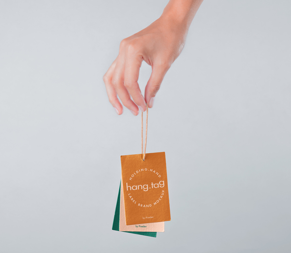 Hand Holding Psd Tag Label Mockup